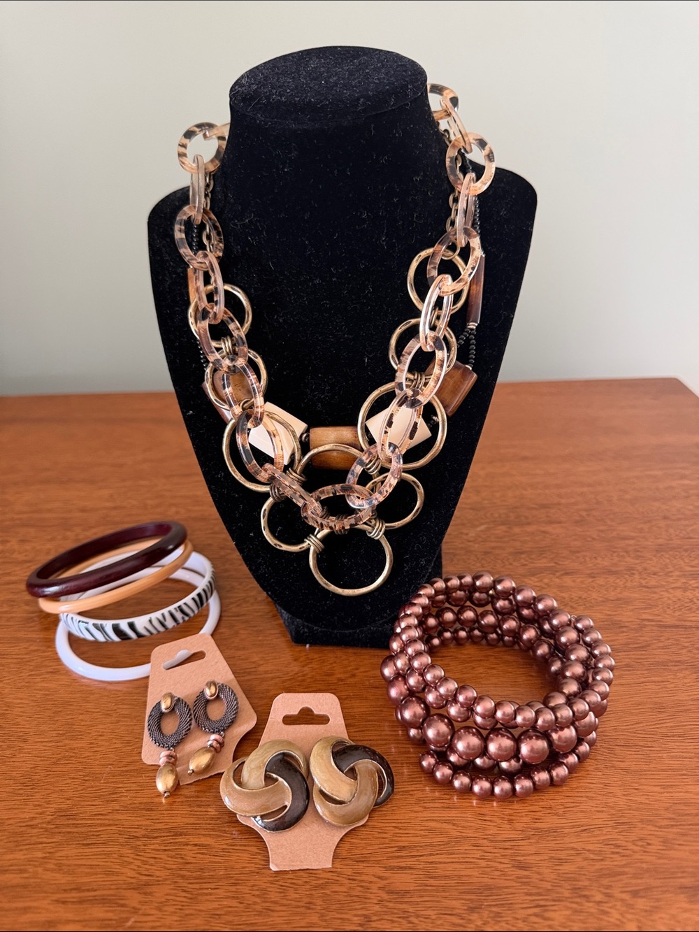 Lot of Jewelry including 3 necklaces, 5 bracelets and 2 pairs of earrings.